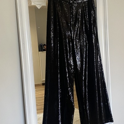 Calças LUCES NEGRAS